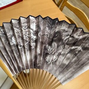 Asian Black and White Dragon Print Fan. Brand new in tube packaging